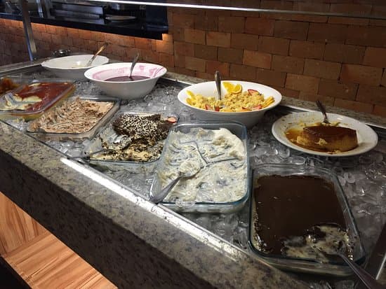 Steakhouse espaçosa de ambiente familiar, despojado e climatizado serve grelhados nobres e opções em buffet.